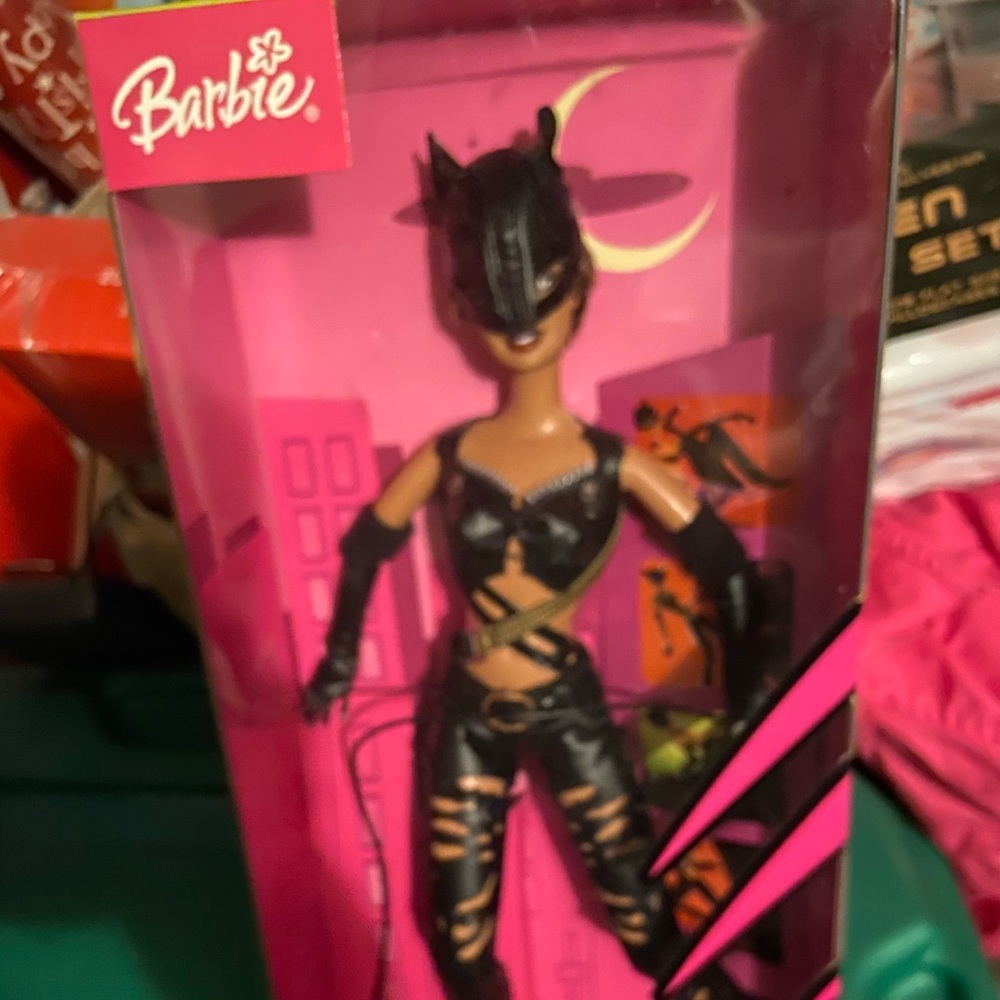 NIB Barbie dressed up as Catwoman in head gear and costume